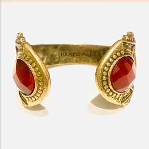 Lucky brand brass cuff with orange stone
